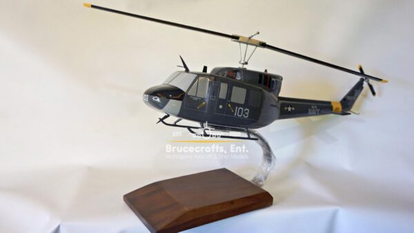 Model of UH-1N Twin Huey US NAVY 103 Aircraft with detailed craftsmanship.